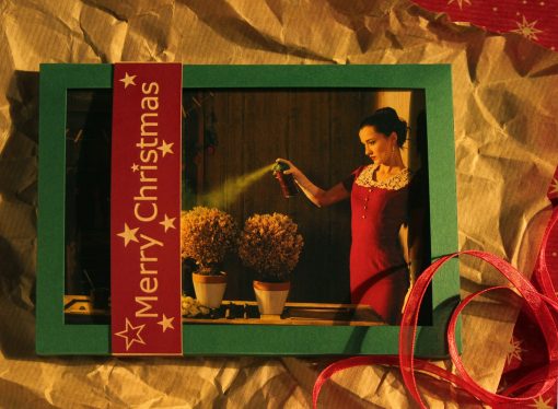 Ein Set Postkarten in Weihnachtlicher Verpackung