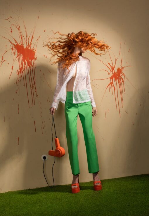 Horst Kistner Twister Fotografie ist eine Kunstfotografie mit Farbexplosion und Retro Mode. Orange und Grün dominieren diese faszinierende Vintage Fotografie.